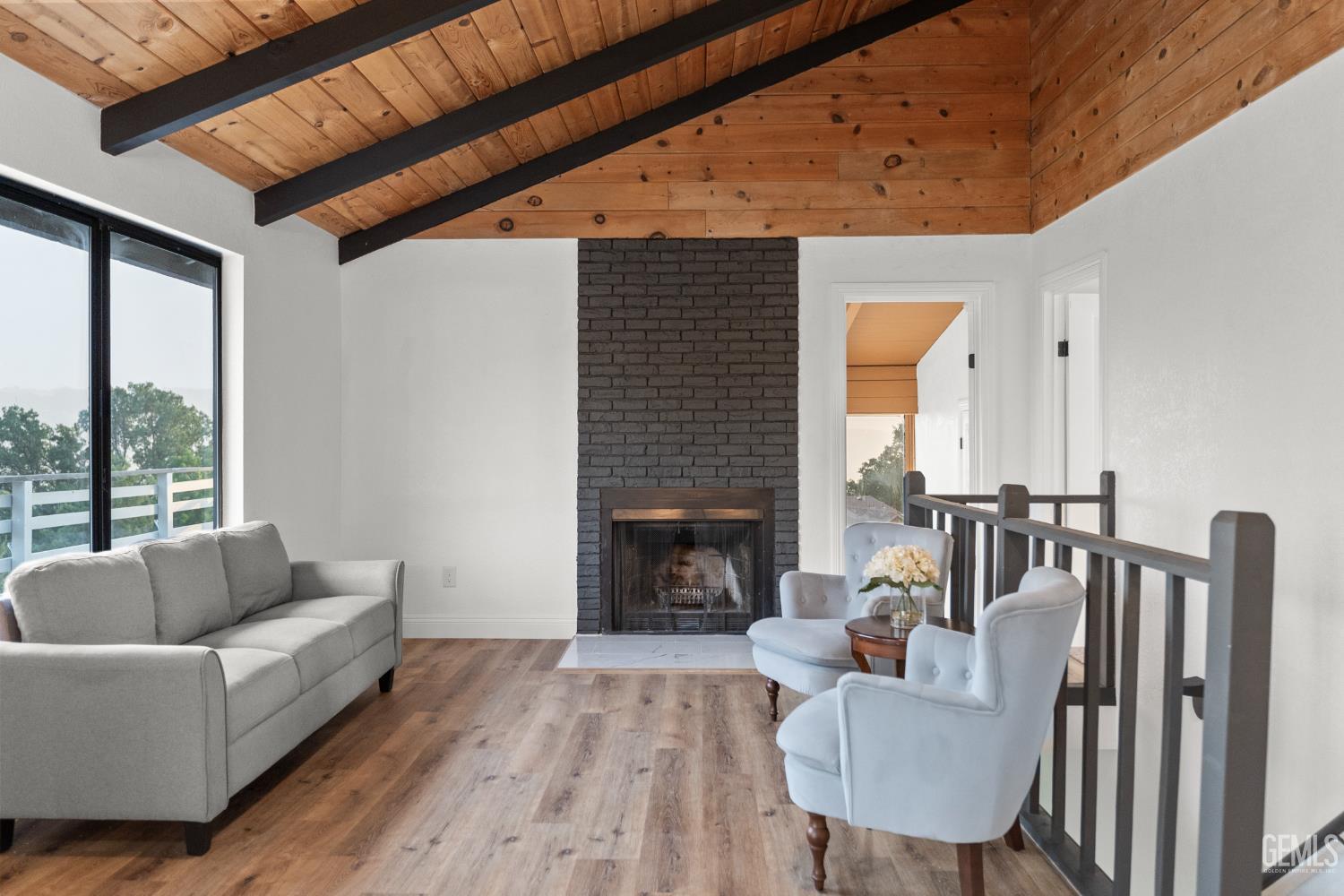 Undisclosed Address Tehachapi, CA 93561 - Photo 16 of 60 a living room with furniture and a fireplace