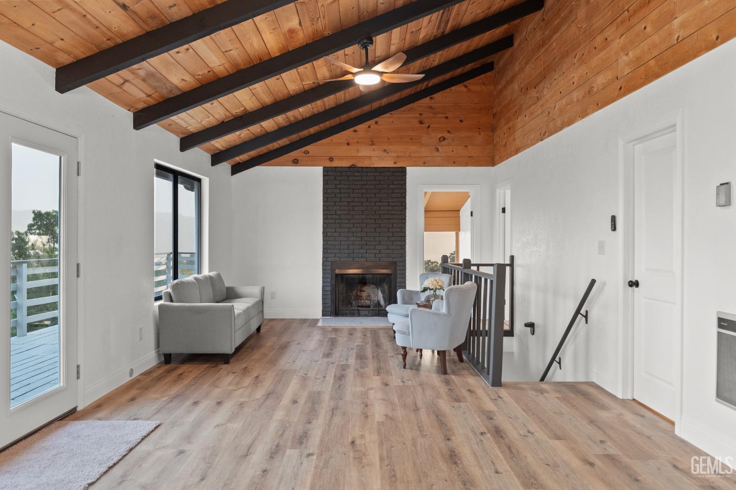 Undisclosed Address Tehachapi, CA 93561 - Photo 17 of 60 a living room with furniture and a wooden floor