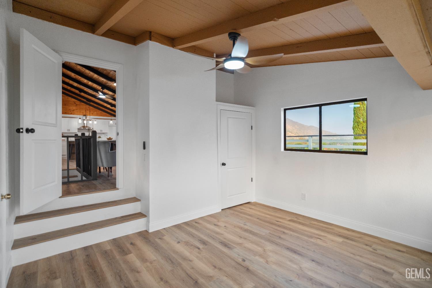 Undisclosed Address Tehachapi, CA 93561 - Photo 33 of 60 wooden floor in an empty room with a window