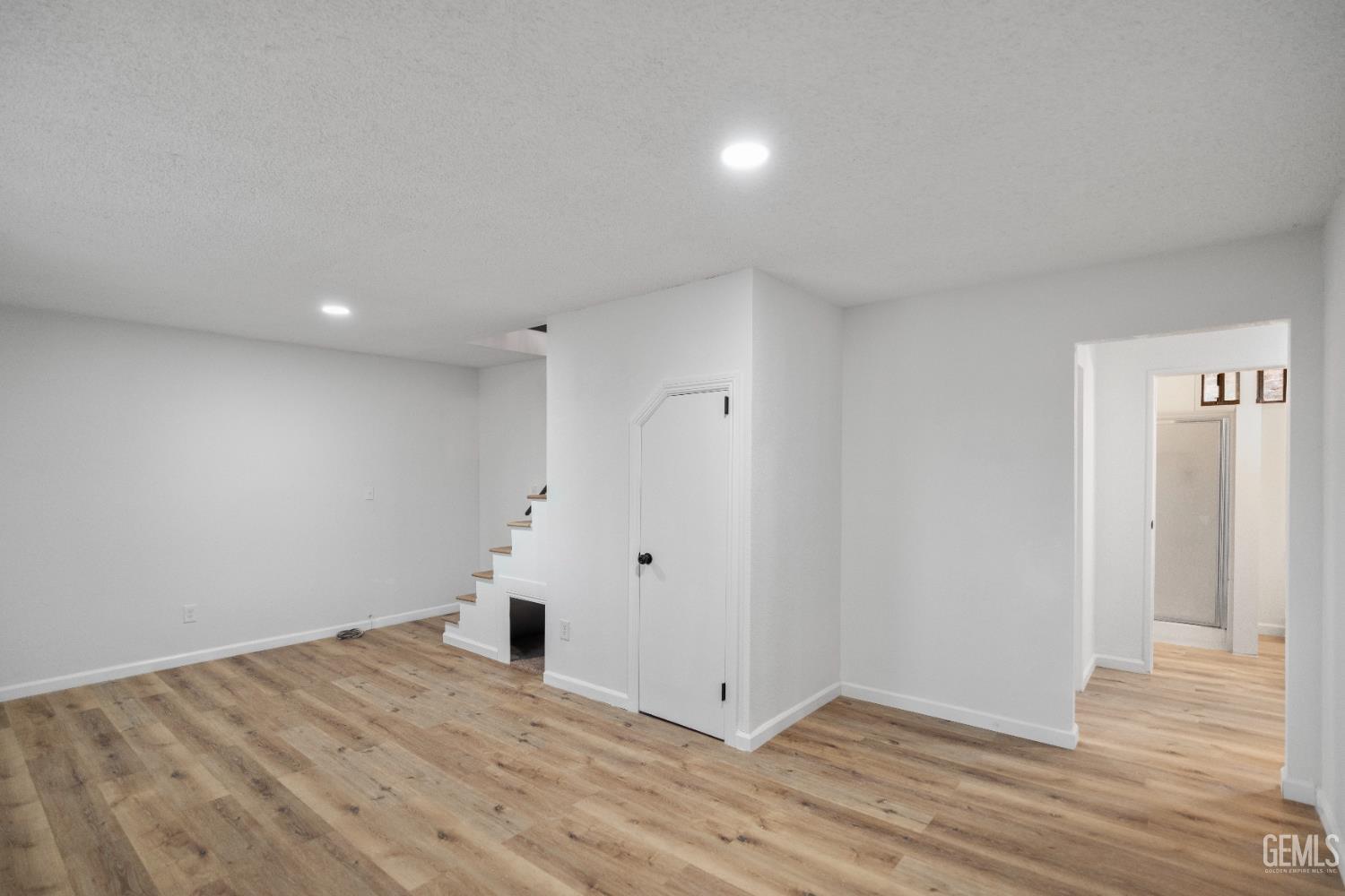 Undisclosed Address Tehachapi, CA 93561 - Photo 40 of 60 a view of empty room with wooden floor