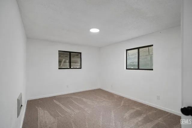 a view of balcony with furniture