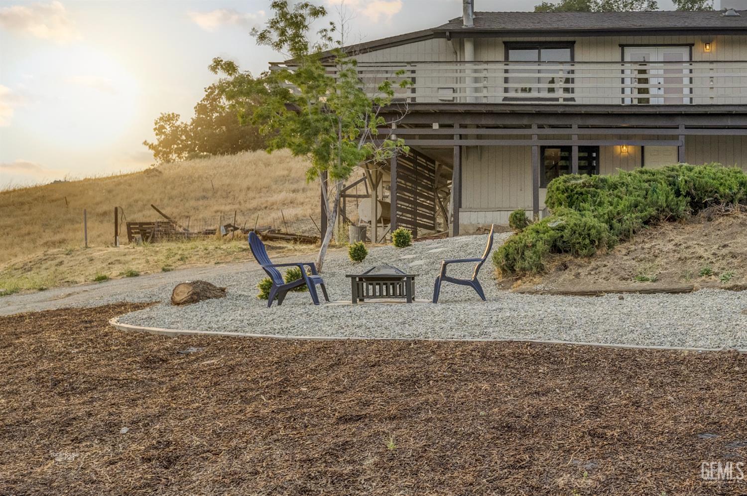 Undisclosed Address Tehachapi, CA 93561 - Photo 6 of 60 a view of a house with a yard
