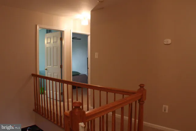 a view of a hallway with entryway