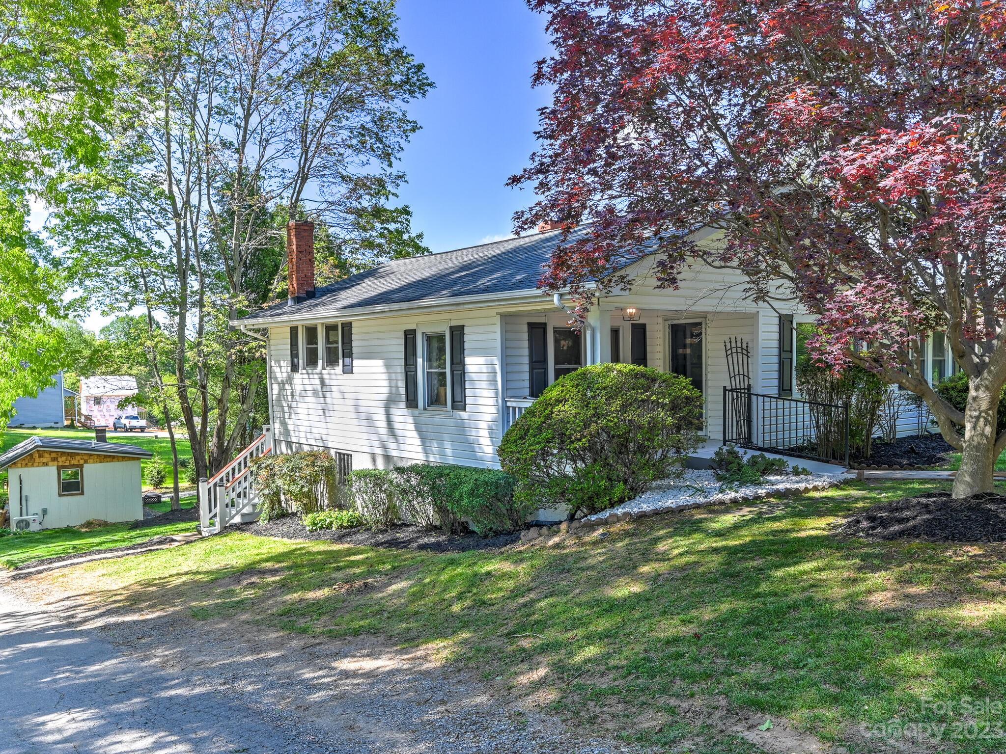 215 Erwin Hills Road Asheville, NC 28806 - Photo 4 of 32 a view of a house with a yard