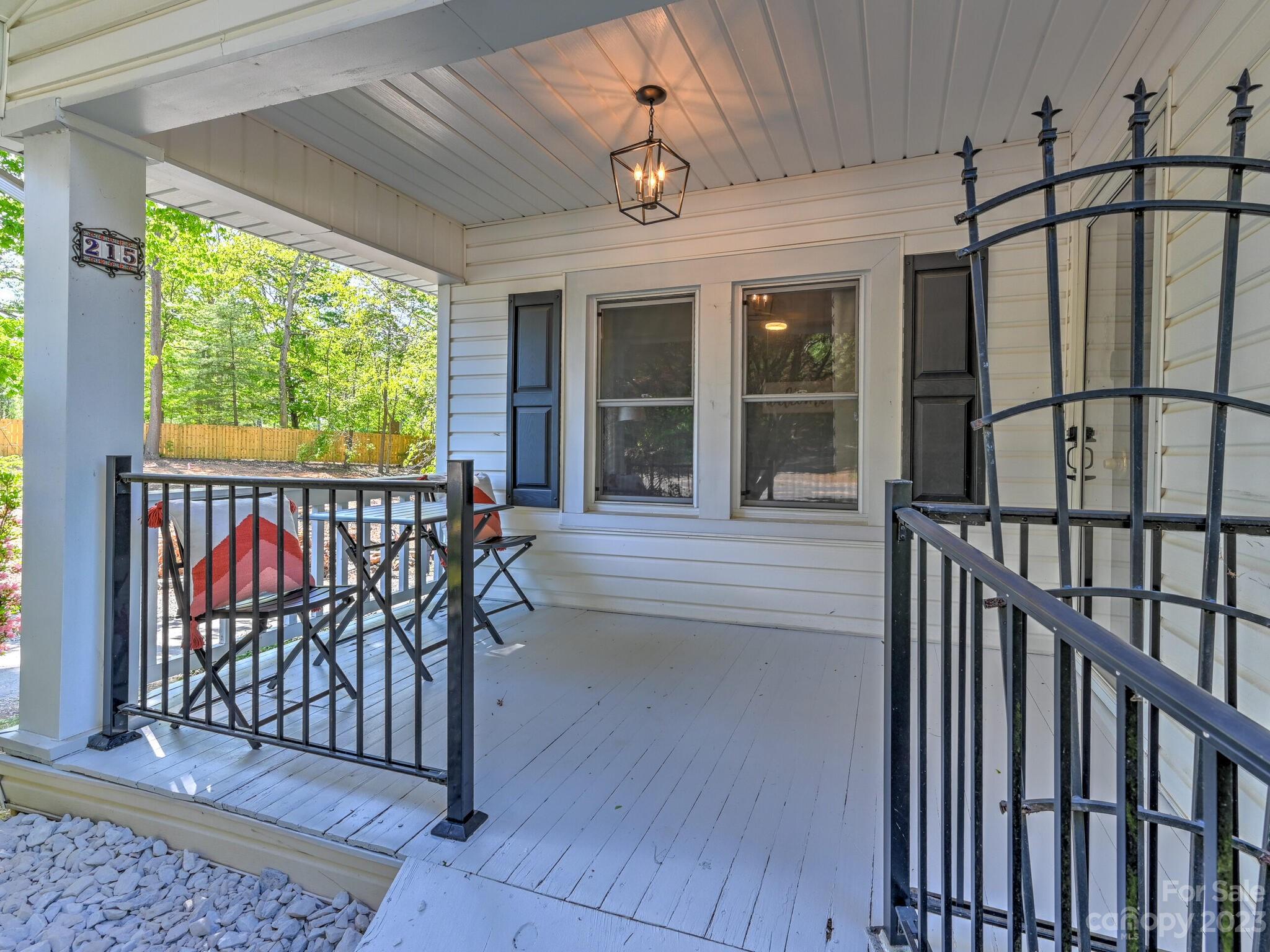 215 Erwin Hills Road Asheville, NC 28806 - Photo 5 of 32 a view of a balcony with furniture