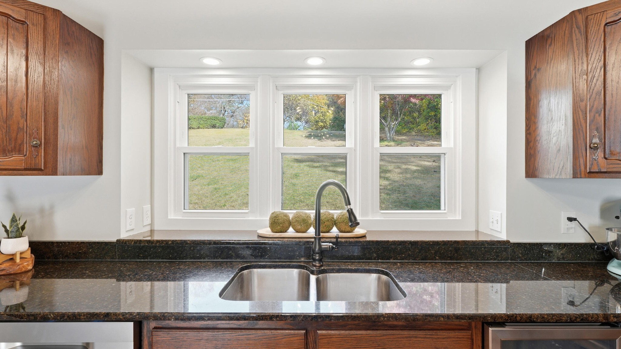 3591 Kings Road Chattanooga, TN 37416 - Photo 17 of 66 a kitchen with granite countertop a sink and a window