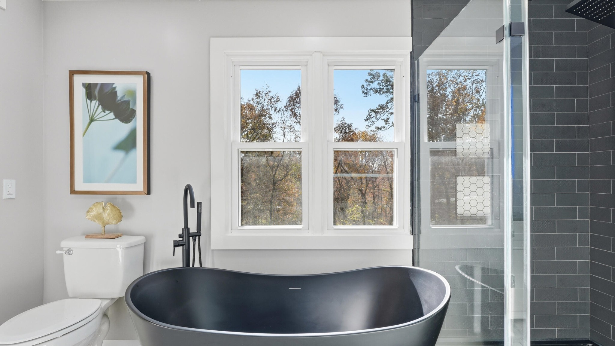 3591 Kings Road Chattanooga, TN 37416 - Photo 26 of 66 a large white tub sitting next to a blue sink