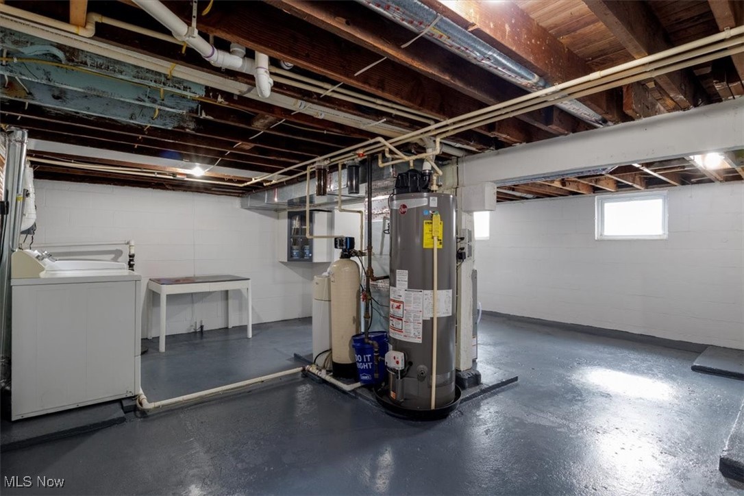 3831 Cook Road Rootstown, OH 44272 - Photo 24 of 25 Basement featuring gas water heater, water softener unit with filtration and natural light