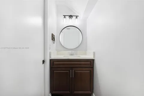 a bathroom with a bathtub and a sink