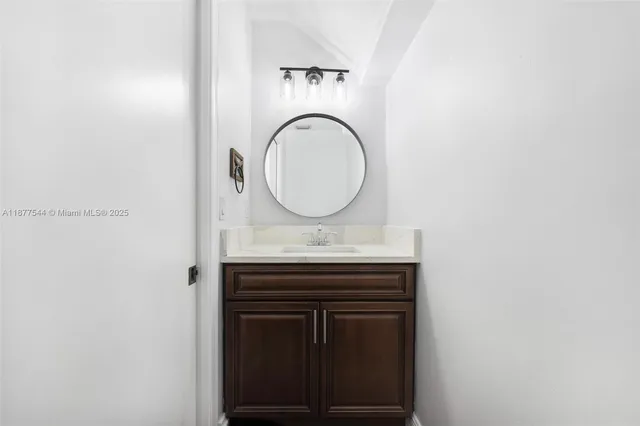 a bathroom with a bathtub and a sink