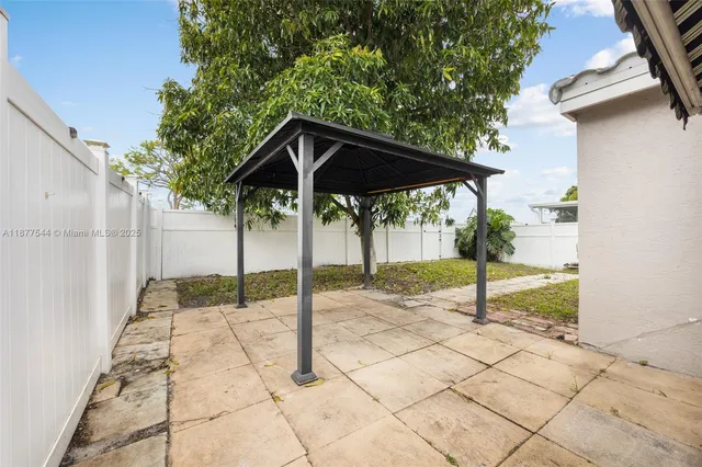 a house with trees in front of it