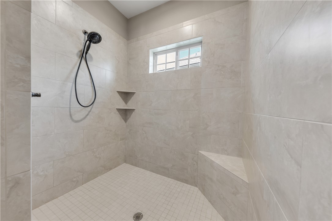 3520 Foxcroft Path Bryan, TX 77808 - Photo 15 of 28 Bathroom with a tile shower