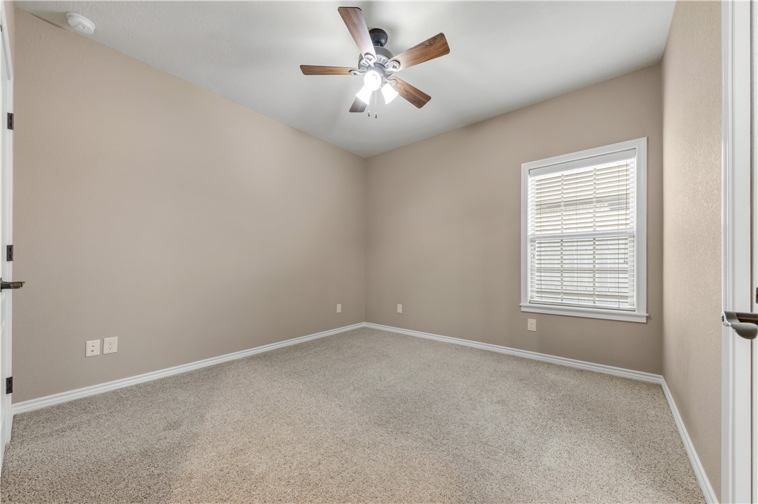 3520 Foxcroft Path Bryan, TX 77808 - Photo 16 of 28 Unfurnished room featuring carpet flooring and ceiling fan
