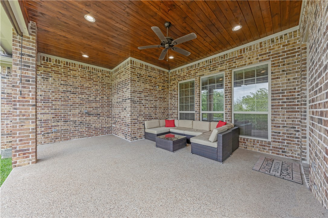 3520 Foxcroft Path Bryan, TX 77808 - Photo 26 of 28 View of patio featuring an outdoor living space and ceiling fan