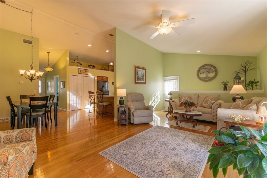 15 Michael Drive, Unit 15 Thorndike, MA 01079 - Photo 3 of 27 a living room with furniture and wooden floor