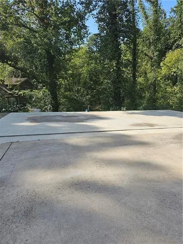 a view of road and trees