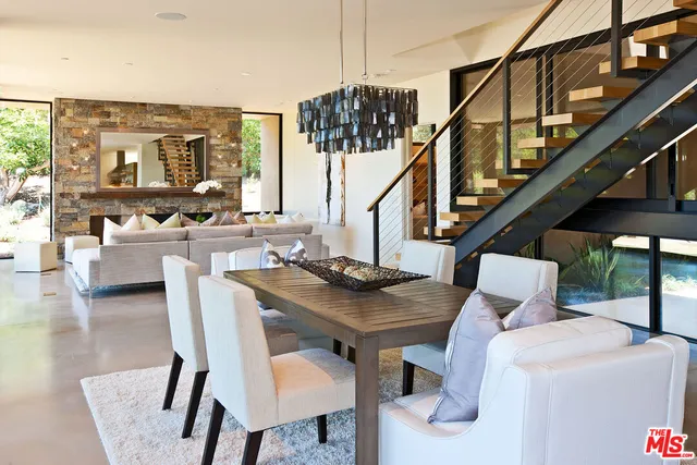 a view of dinning table and chairs in the patio
