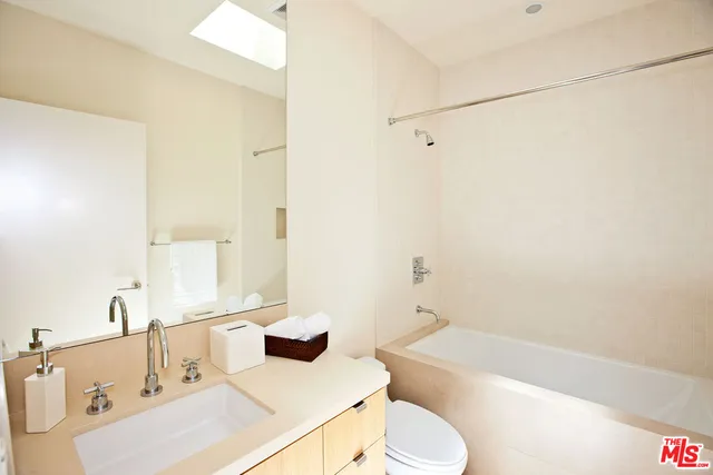 a bathroom with a sink and a bathtub