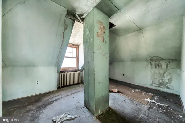 a view of parking garage with cars