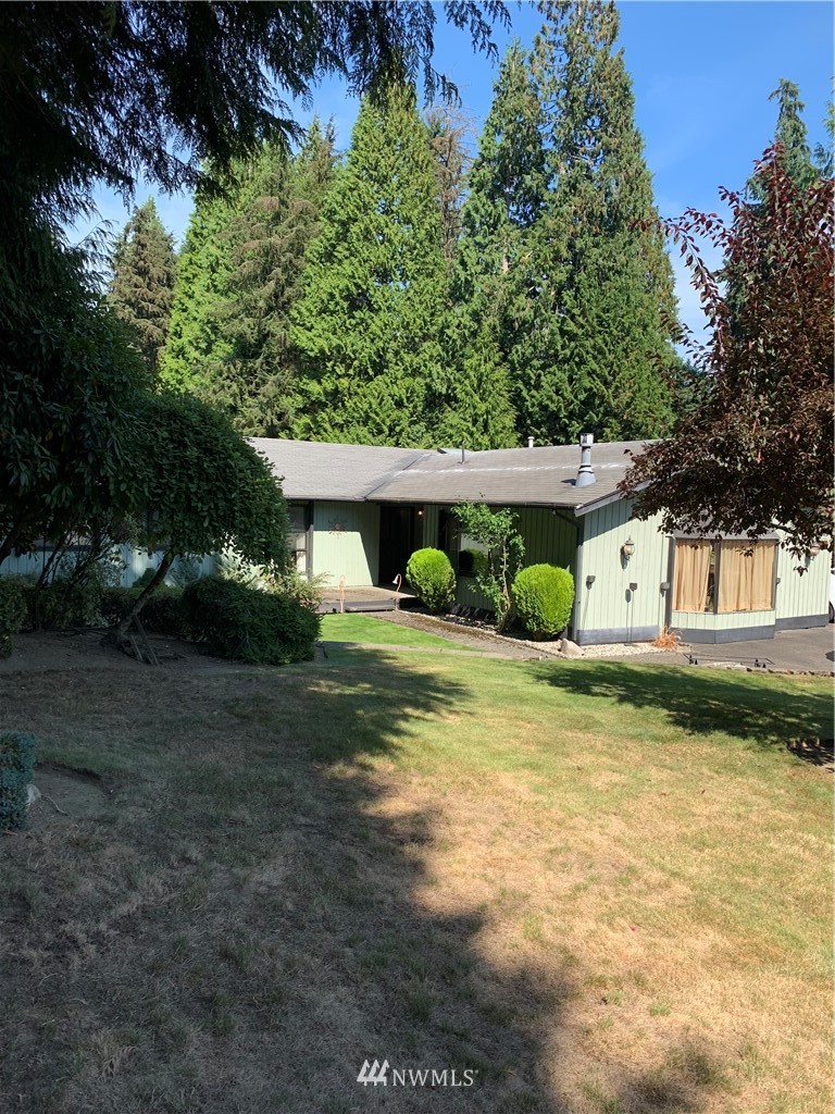 5615 227th Street Southeast Bothell, WA 98021 - Photo 3 of 30 a view of a house with a yard