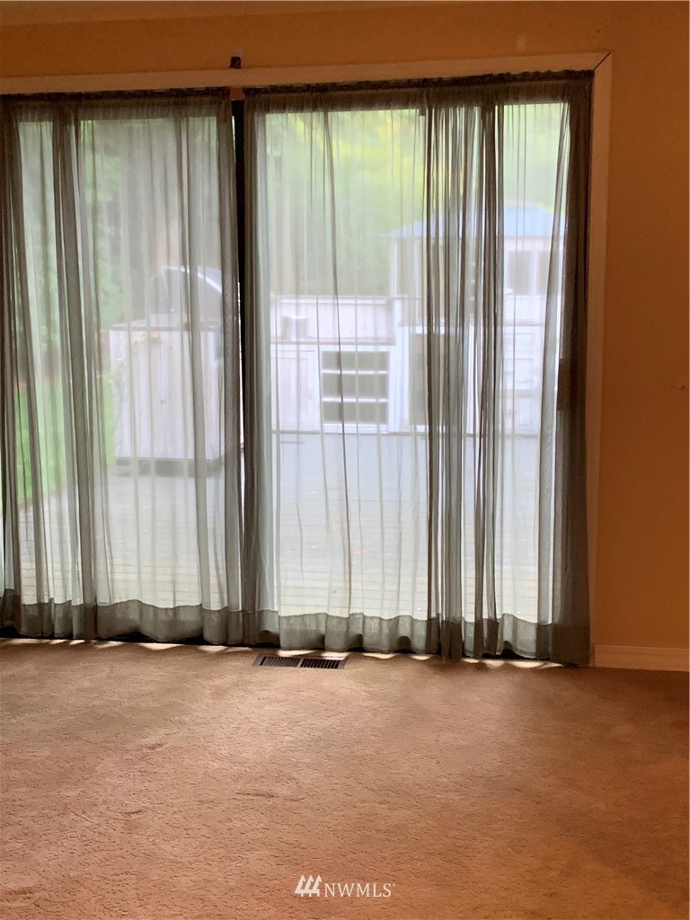 5615 227th Street Southeast Bothell, WA 98021 - Photo 23 of 30 an empty room with a window