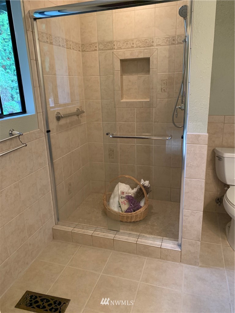 5615 227th Street Southeast Bothell, WA 98021 - Photo 27 of 30 a bathroom with a shower