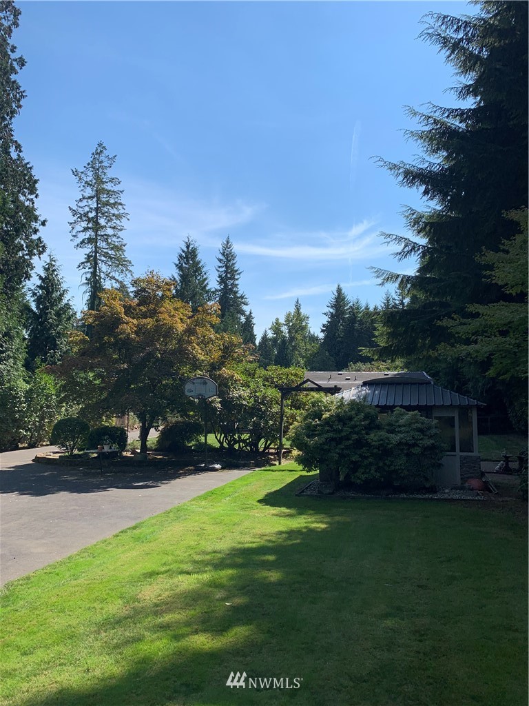 5615 227th Street Southeast Bothell, WA 98021 - Photo 4 of 30 a view of outdoor space with deck and green space
