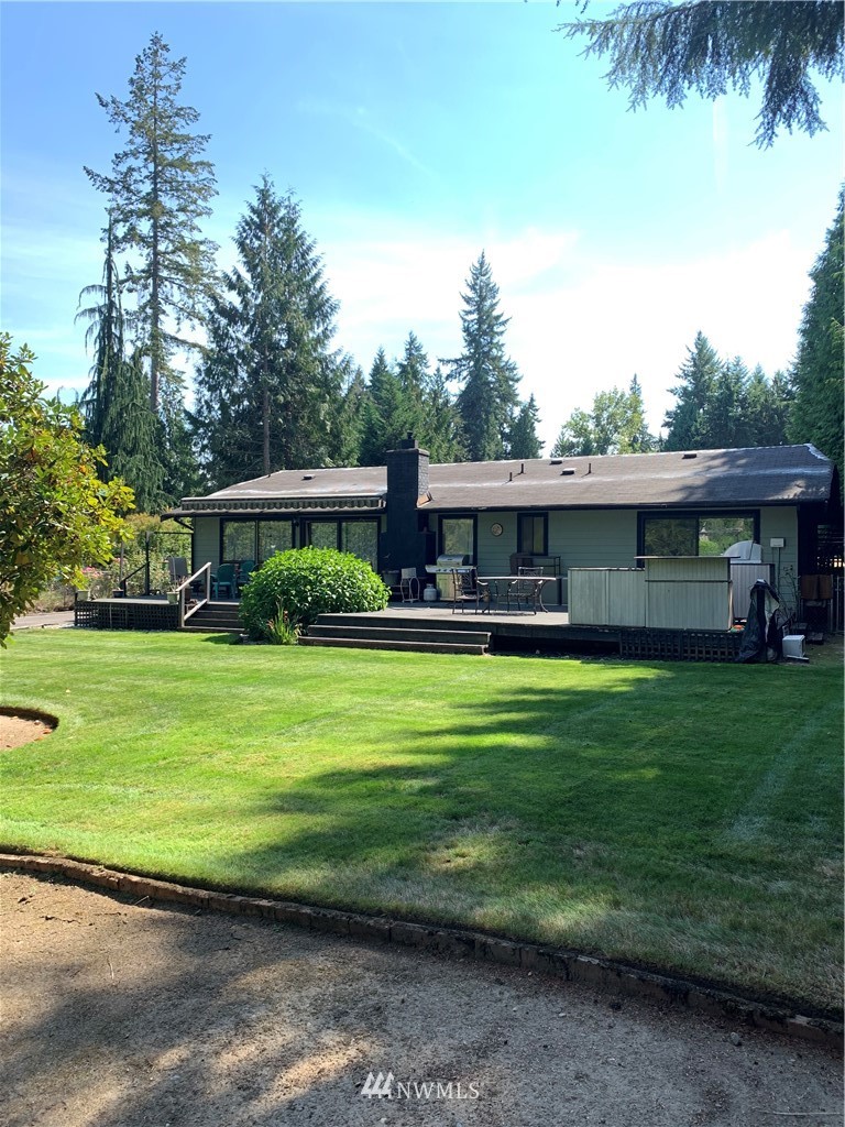 5615 227th Street Southeast Bothell, WA 98021 - Photo 5 of 30 a view of a house with a yard