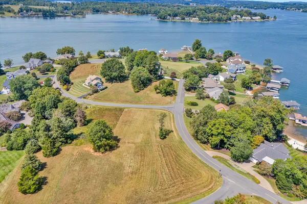 an aerial view of a houses with outdoor space