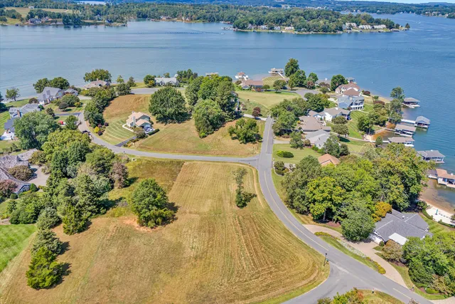an aerial view of a houses with outdoor space