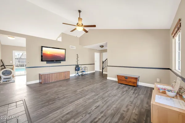 a view of a dining room with furniture window and outside view