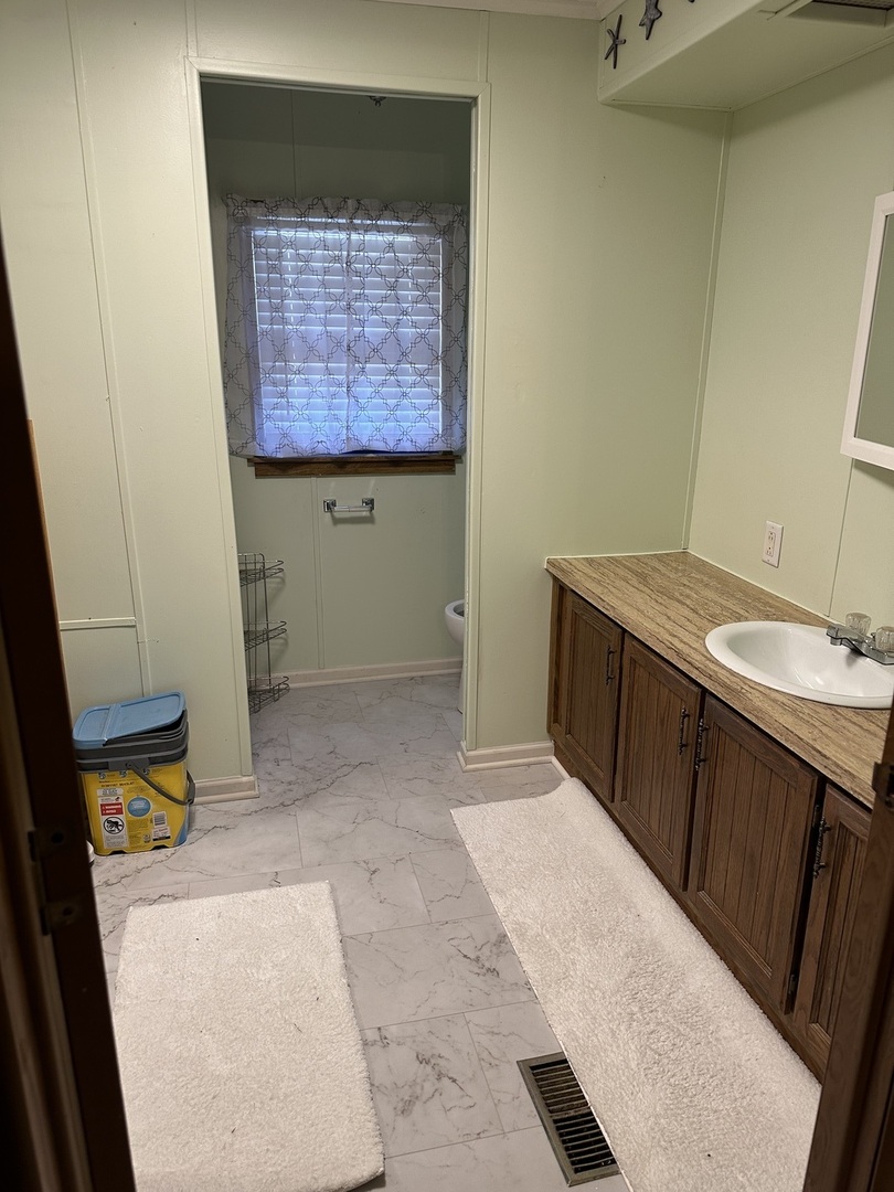 6801 South La Grange Road, Unit 155 Hodgkins, IL 60525 - Photo 7 of 8 a hallway with washer and dryer
