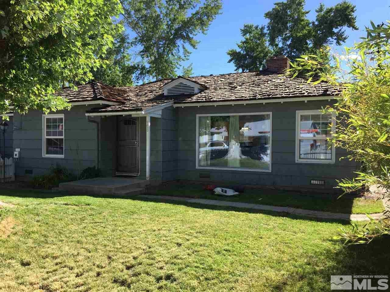 908 Arbutus Street Reno, NV 89509 - Photo 1 of 1 a front view of house with yard