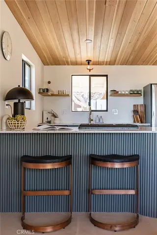 a view of workspace with painting on the wall