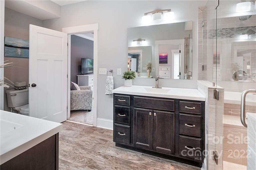 3654 Lake Shore Road South Denver, NC 28037 - Photo 21 of 48 a bathroom with a sink vanity and a mirror