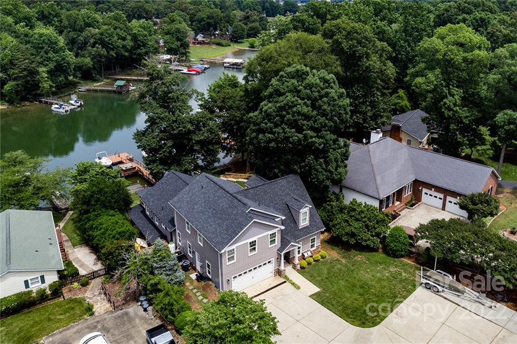 3654 Lake Shore Road South Denver, NC 28037 - Photo 48 of 48 an aerial view of a house with a garden and lake view