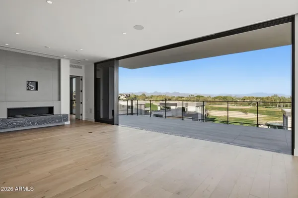 a living room with furniture and a table