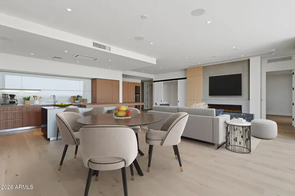 a kitchen with stainless steel appliances a sink stove and cabinets