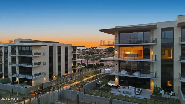 a view of a house with a small yard