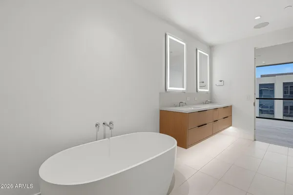 a view of an empty room with a fireplace