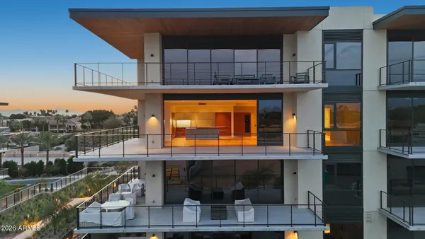 a living room with a couch and a flat screen tv