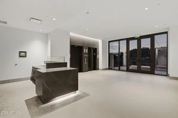 a view of a living room and a potted plant