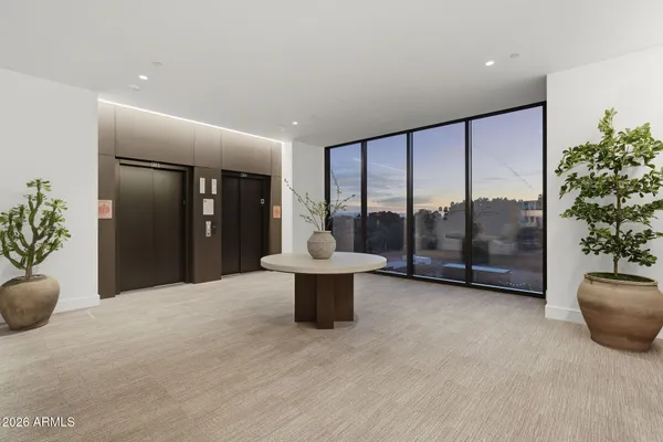 a view of a room with view of ocean