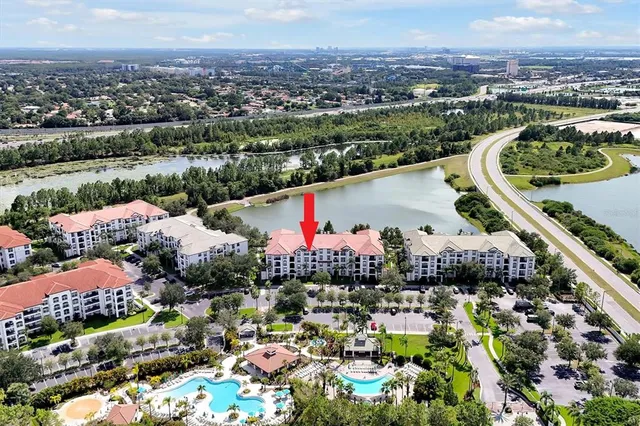 an aerial view of lake residential house and outdoor space