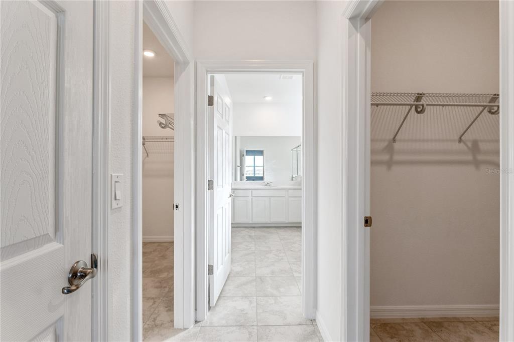 7405 Southwest 61st Street Ocala, FL 34474 - Photo 22 of 46 a view of a bathroom from a hallway