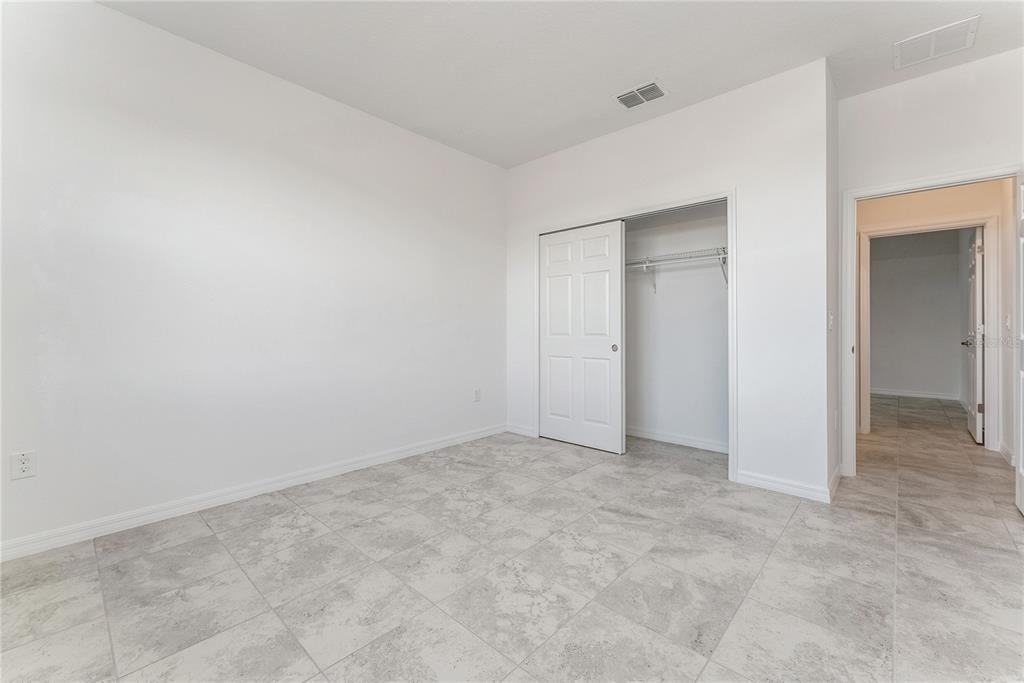 7405 Southwest 61st Street Ocala, FL 34474 - Photo 27 of 46 an empty room with closet area