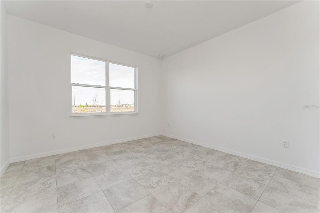 7405 Southwest 61st Street Ocala, FL 34474 - Photo 28 of 46 an empty room with a window
