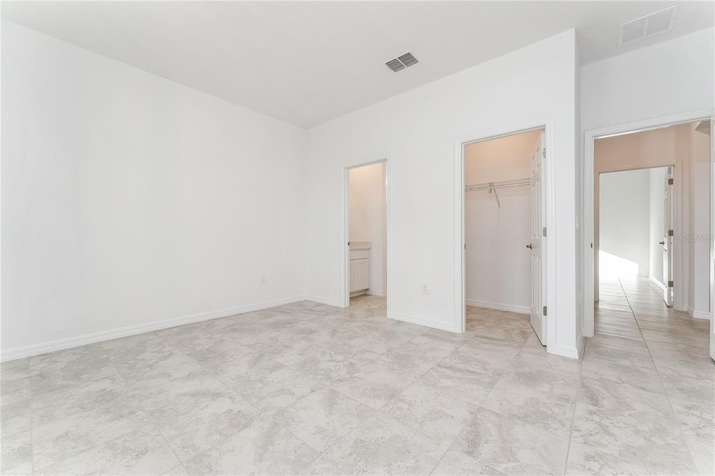 7405 Southwest 61st Street Ocala, FL 34474 - Photo 34 of 46 an empty room with an entryway