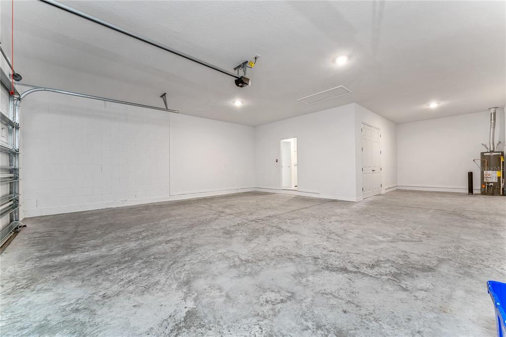 7405 Southwest 61st Street Ocala, FL 34474 - Photo 41 of 46 an empty room with ceiling fan and windows