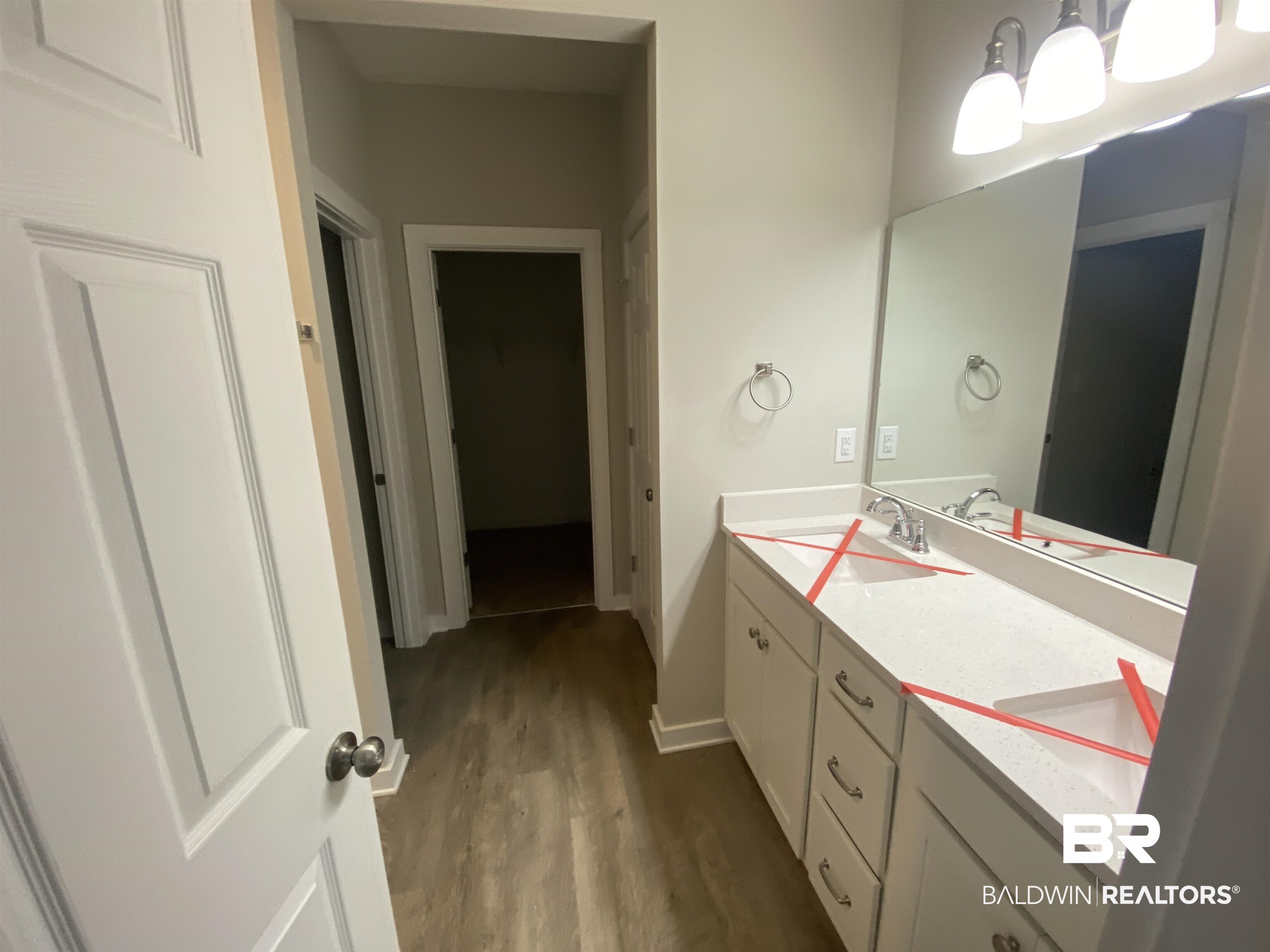 1279 Cater Lee Way Foley, AL 36535 - Photo 12 of 12 Bathroom featuring hardwood / wood-style flooring and vanity